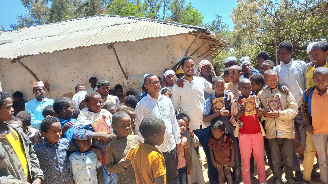Orphans receiving Qurans